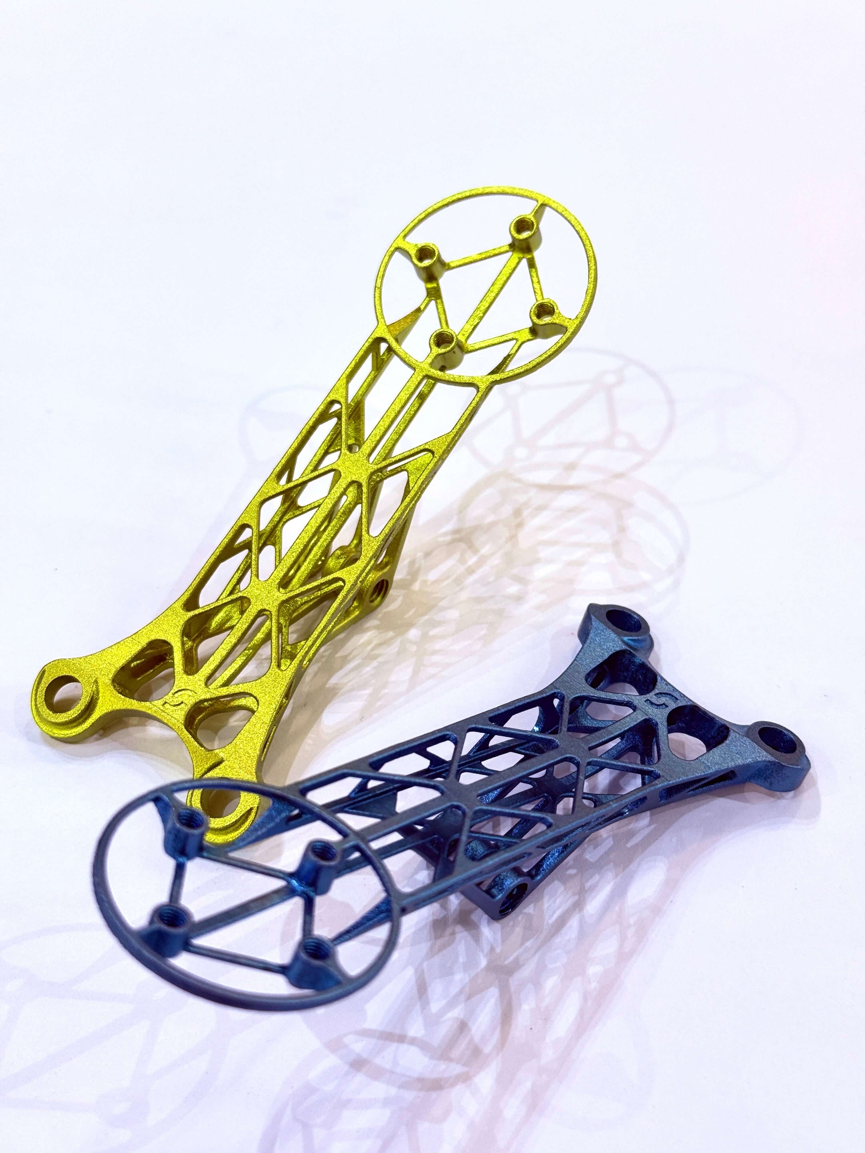 Customize 3D Titanium Bike Computer Mount Color in yellow and blue variations on a white background.